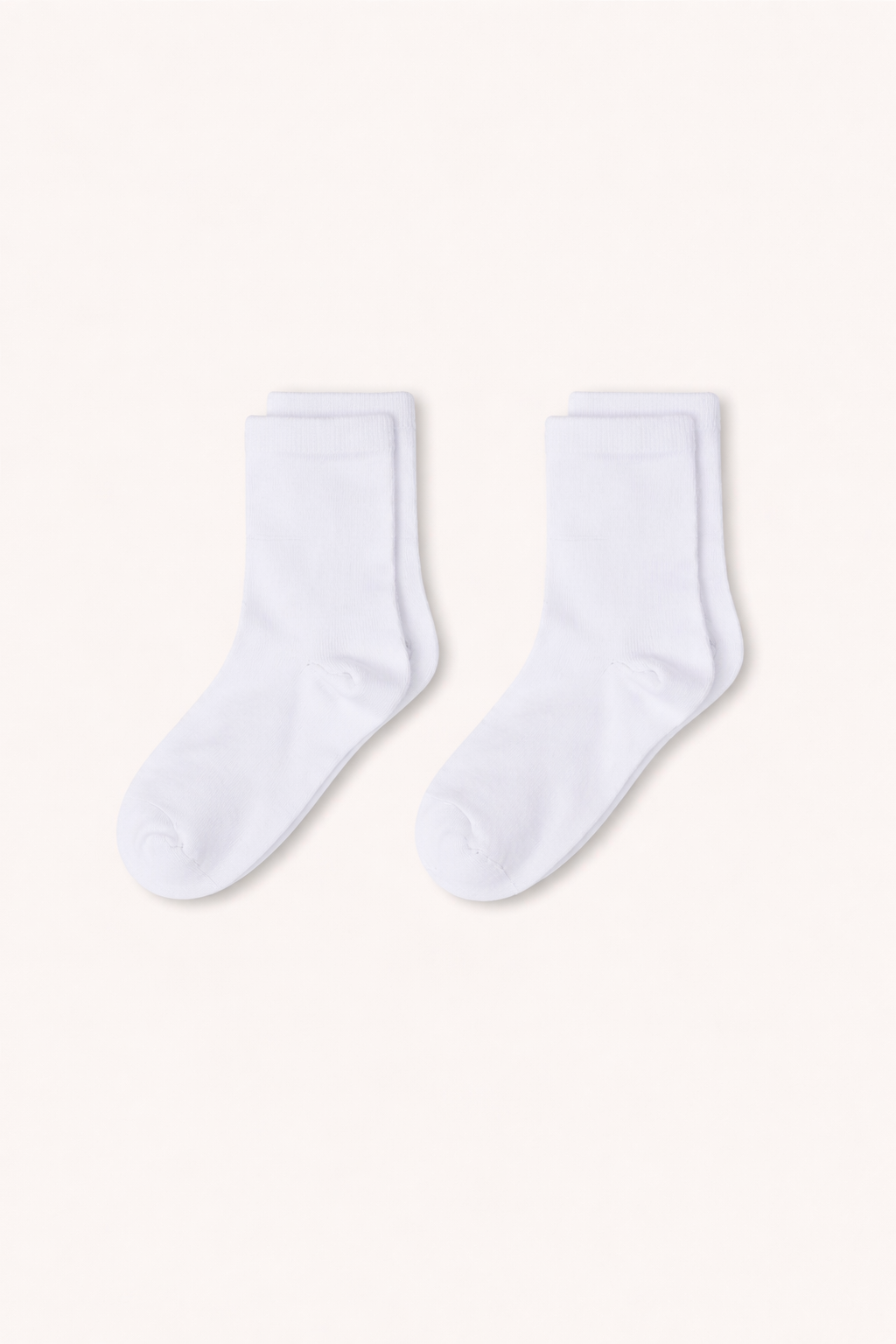 Two white socks on a white background