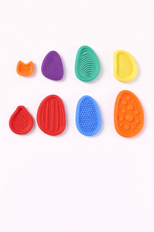 Set of colorful silicone tools on a white background